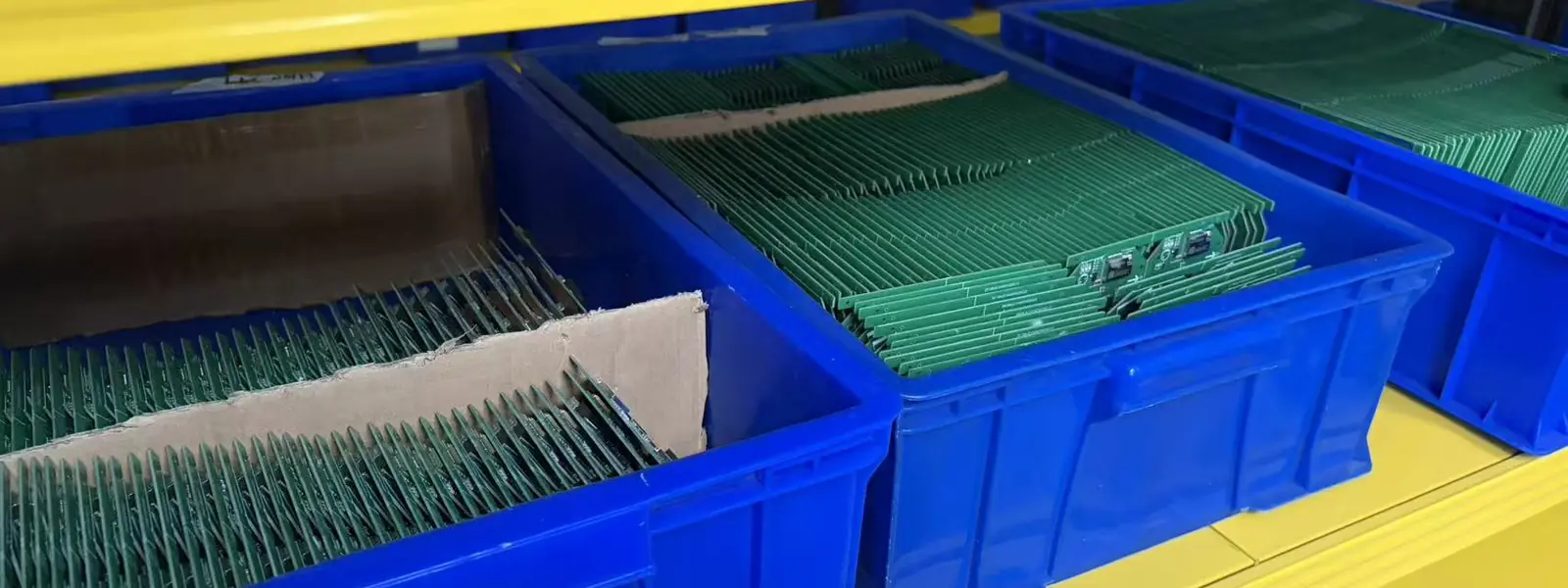Electronics inspection of a control board at the GreenyFox factory